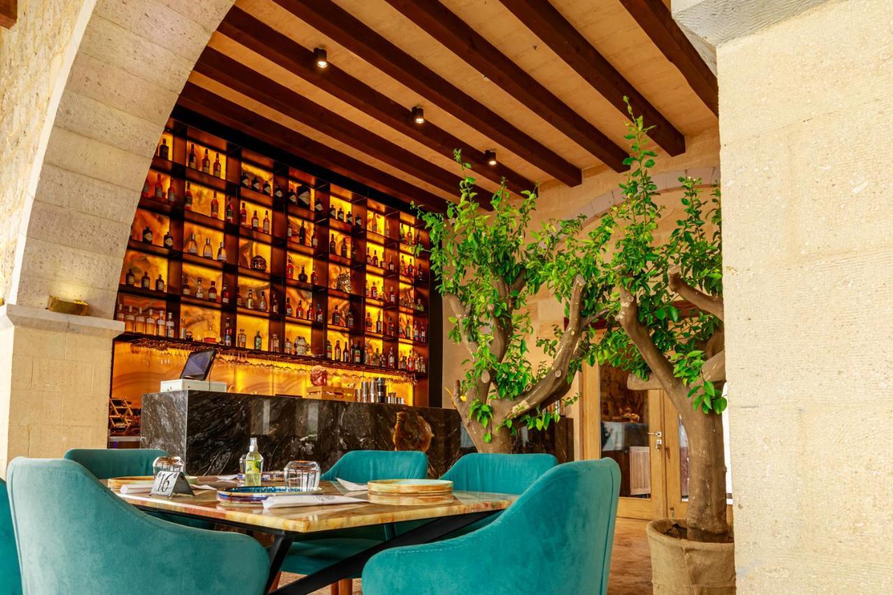 Millstone Cave Suites Hotel Учисар Экстерьер фото