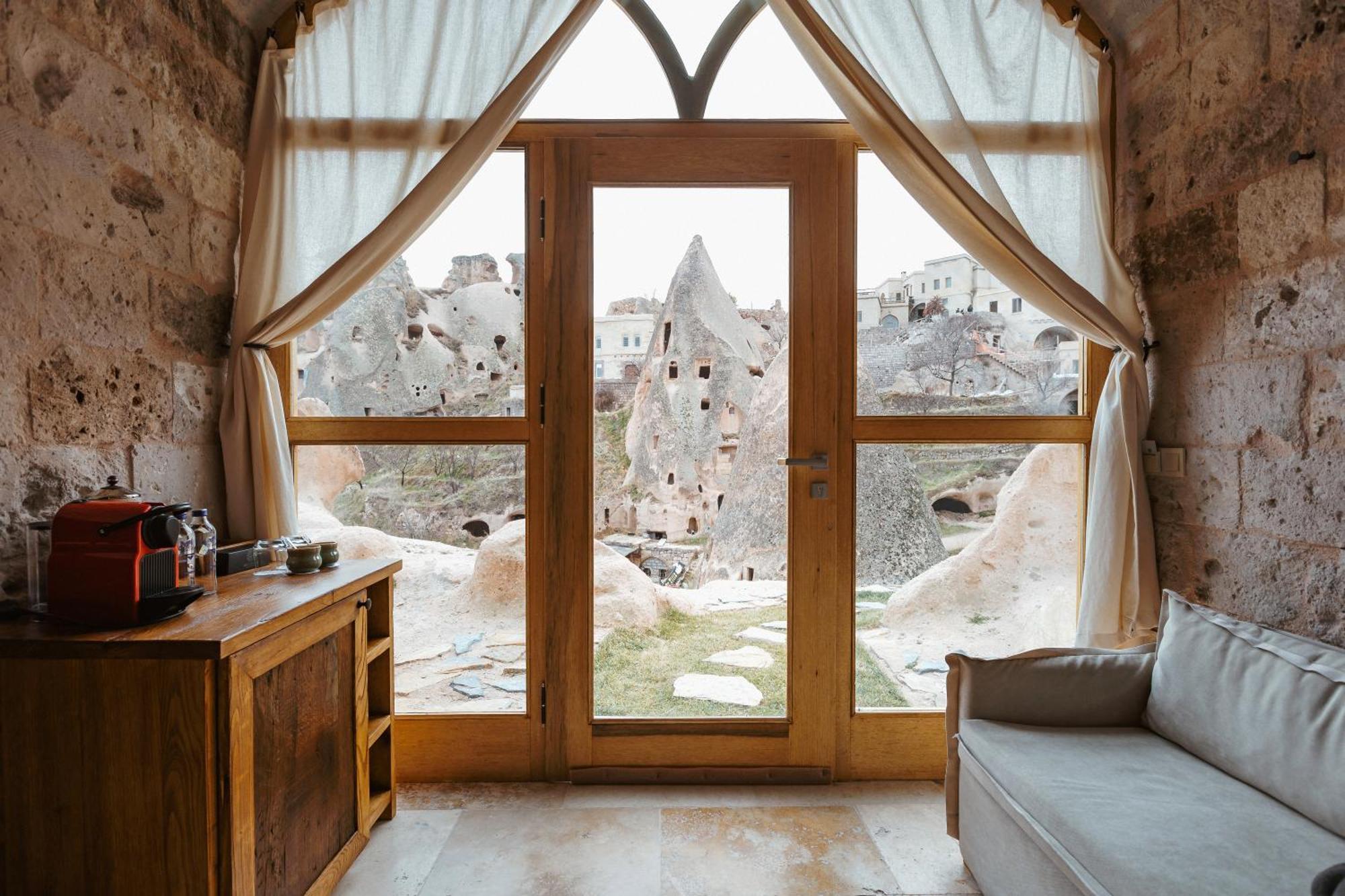 Millstone Cave Suites Hotel Учисар Экстерьер фото