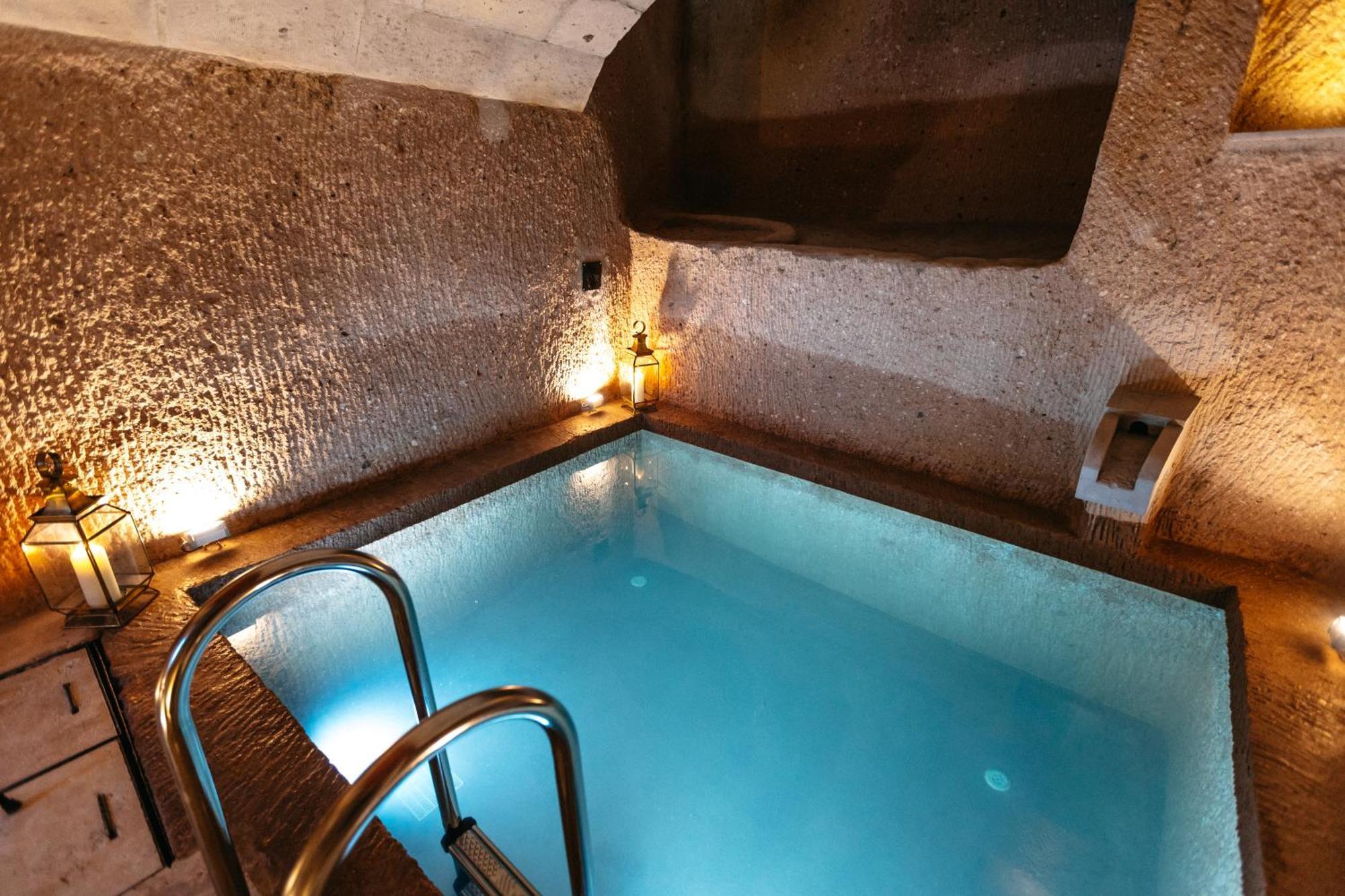 Millstone Cave Suites Hotel Учисар Экстерьер фото