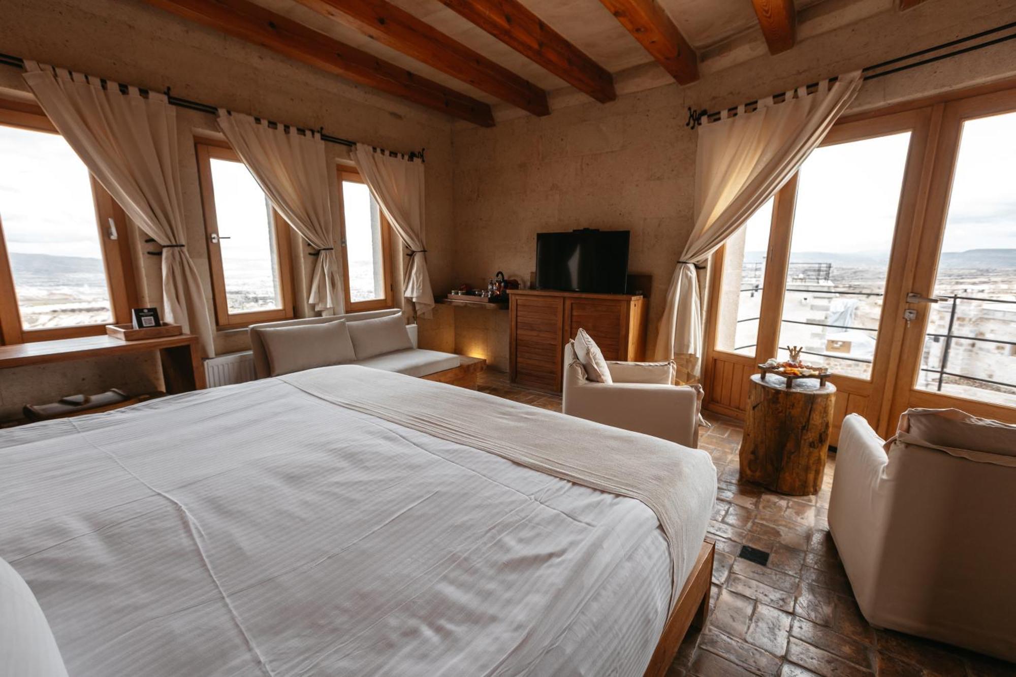 Millstone Cave Suites Hotel Учисар Экстерьер фото