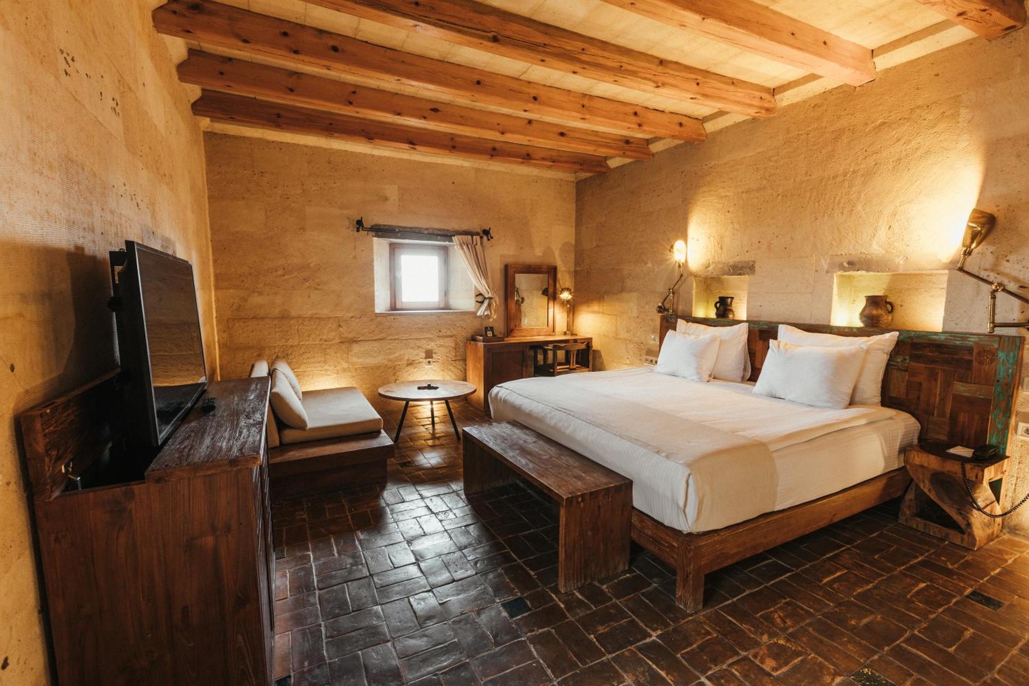 Millstone Cave Suites Hotel Учисар Экстерьер фото