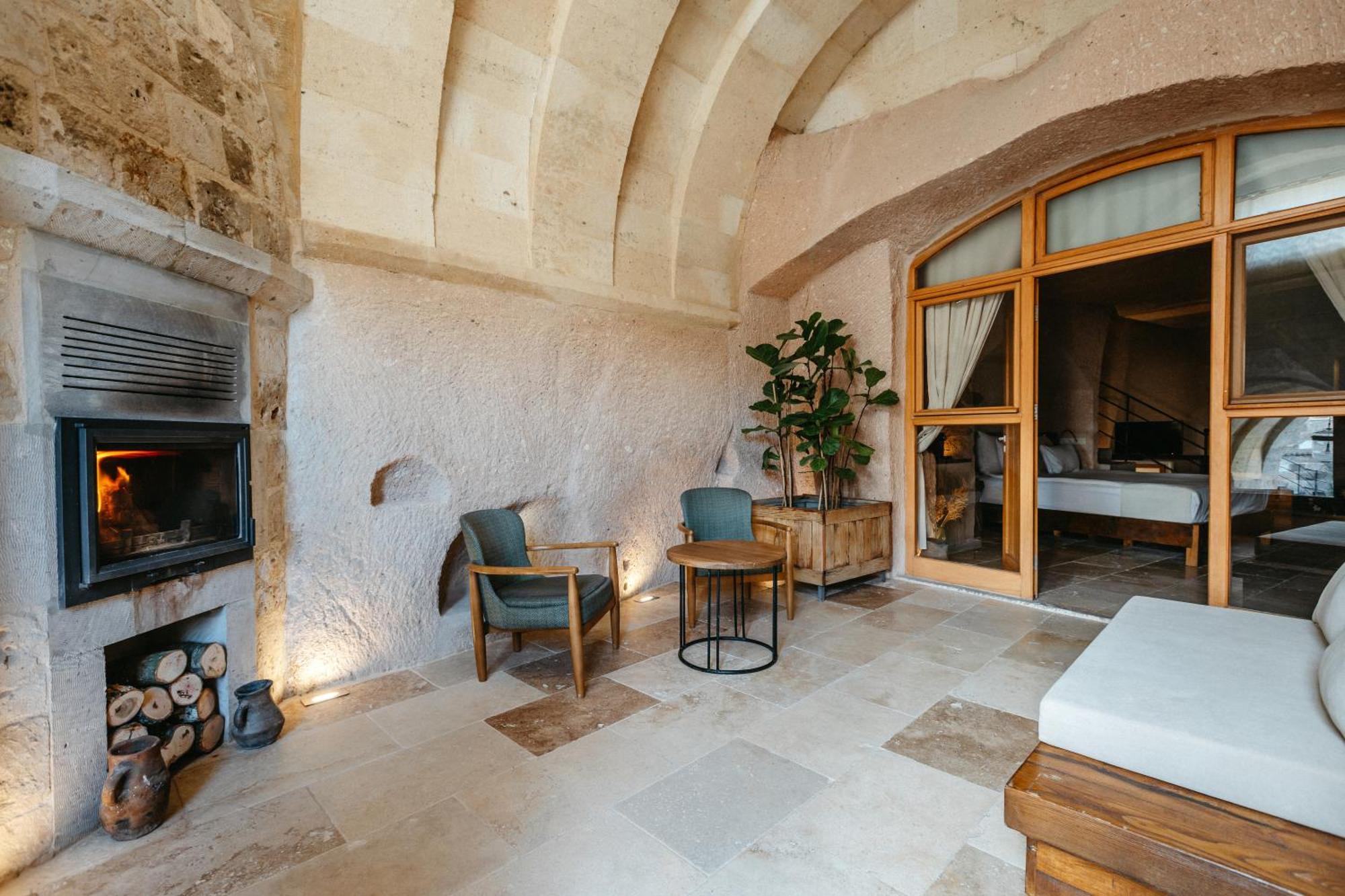 Millstone Cave Suites Hotel Учисар Экстерьер фото
