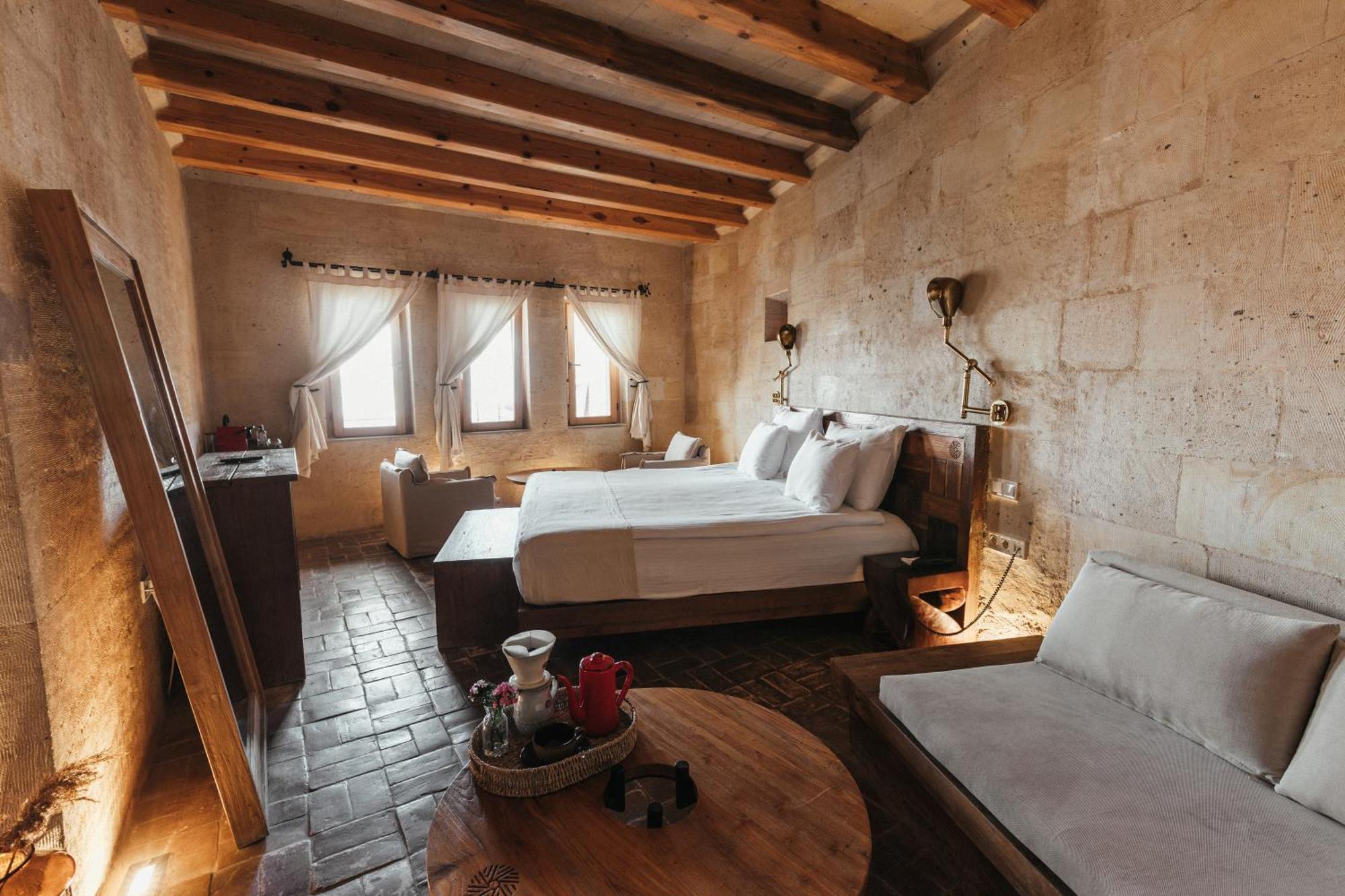 Millstone Cave Suites Hotel Учисар Экстерьер фото